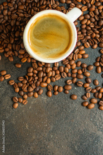 coffee cup and coffee grain  fresh  hot  aromatic drink . top food background. copy space