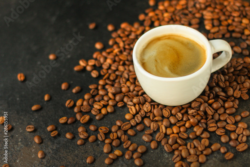 coffee cup and coffee grain (fresh, hot, aromatic drink). top food background. copy space