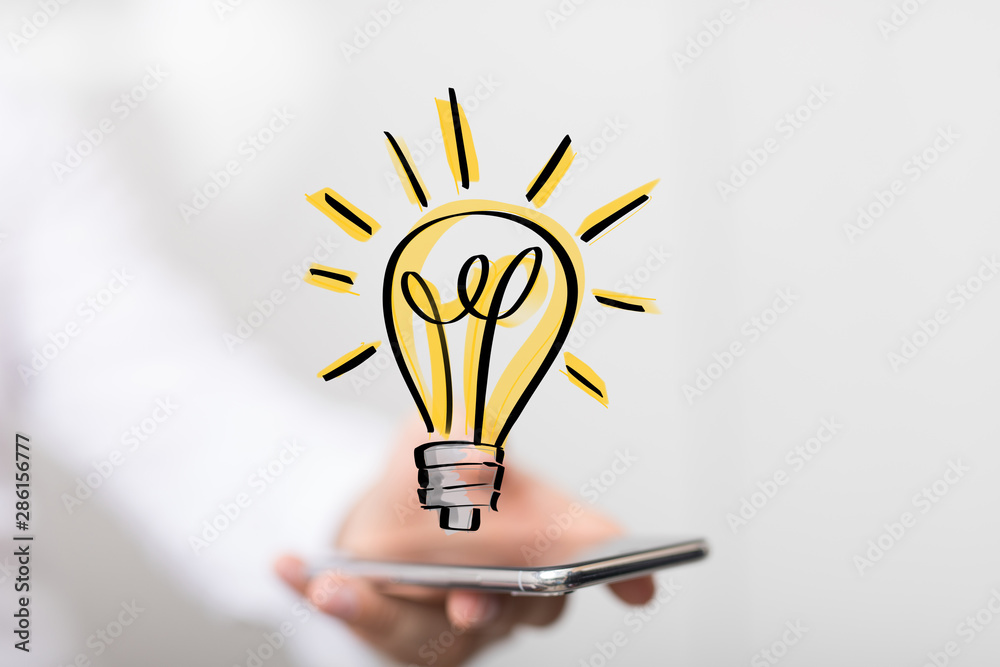 holding illuminated light bulb, idea, innovation and inspiration concept. holding illuminated light bulb, idea, innovation and inspiration concept.