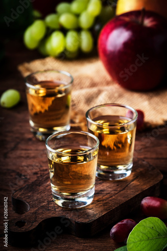 Fotografija Rakija, raki or rakia - Balkan hard alcoholic drink or brandy from fermented fru