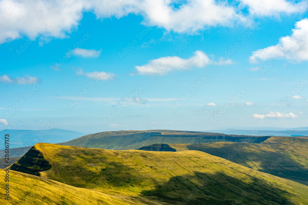 Fototapeta premium Landscape picture of Brecon Beacons Cribyn peak with a big space at the top of the picture covered with the sky