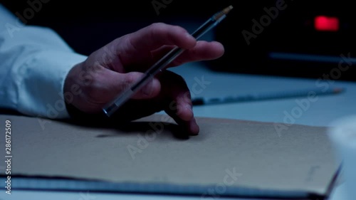 Police Custody Suite - Detective Interviewing a Suspect - Subdued Moody Lighting