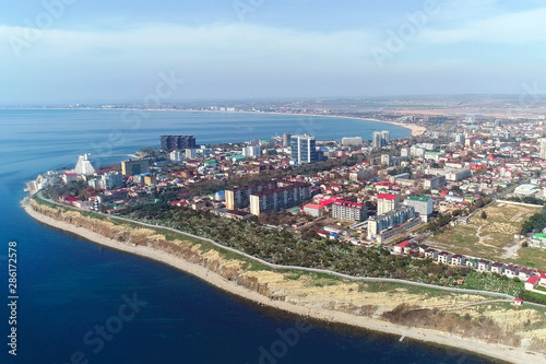 Flying over the coastal city in mountains Anapa in Russia, aerial view. © familylifestyle