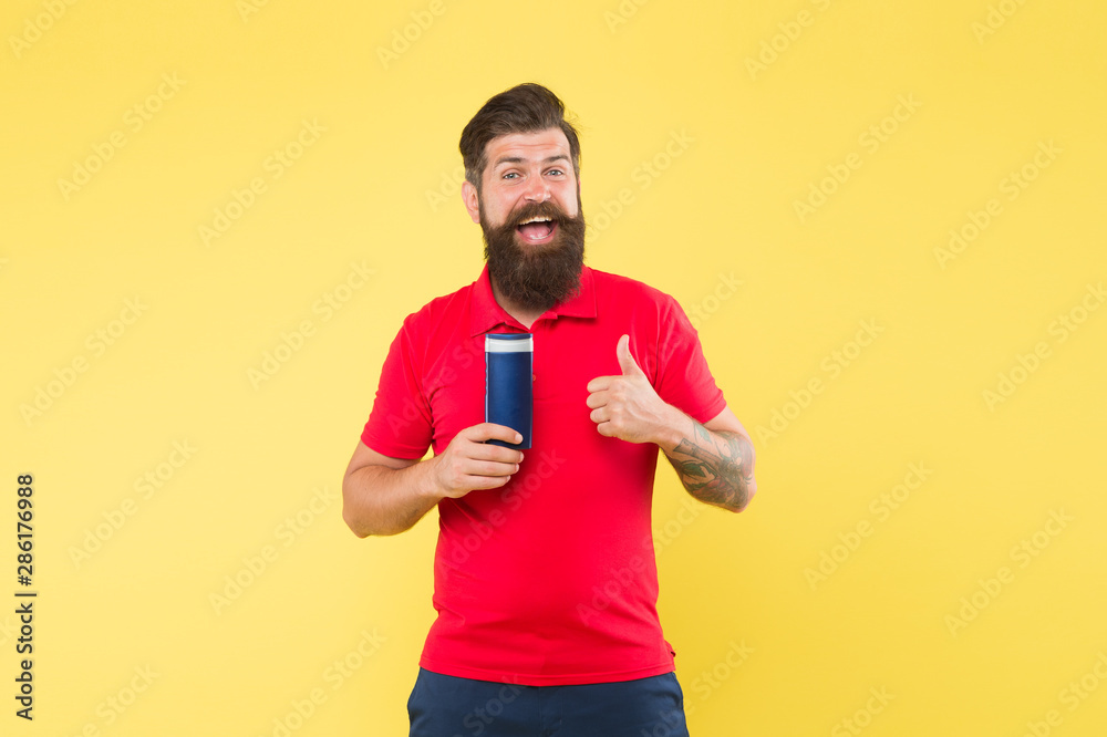 Man cheerful handsome bearded hipster hold bottle shampoo shower gel. Just fabulous hair. Shampoo conditioner for men. Plastic container with shampoo. Shampoo for hair type. Make hair stronger Man cheerful handsome bearded hipster hold bottle shampoo shower gel. Just fabulous hair. Shampoo conditioner for men. Plastic container with shampoo. Shampoo for hair type. Make hair stronger
