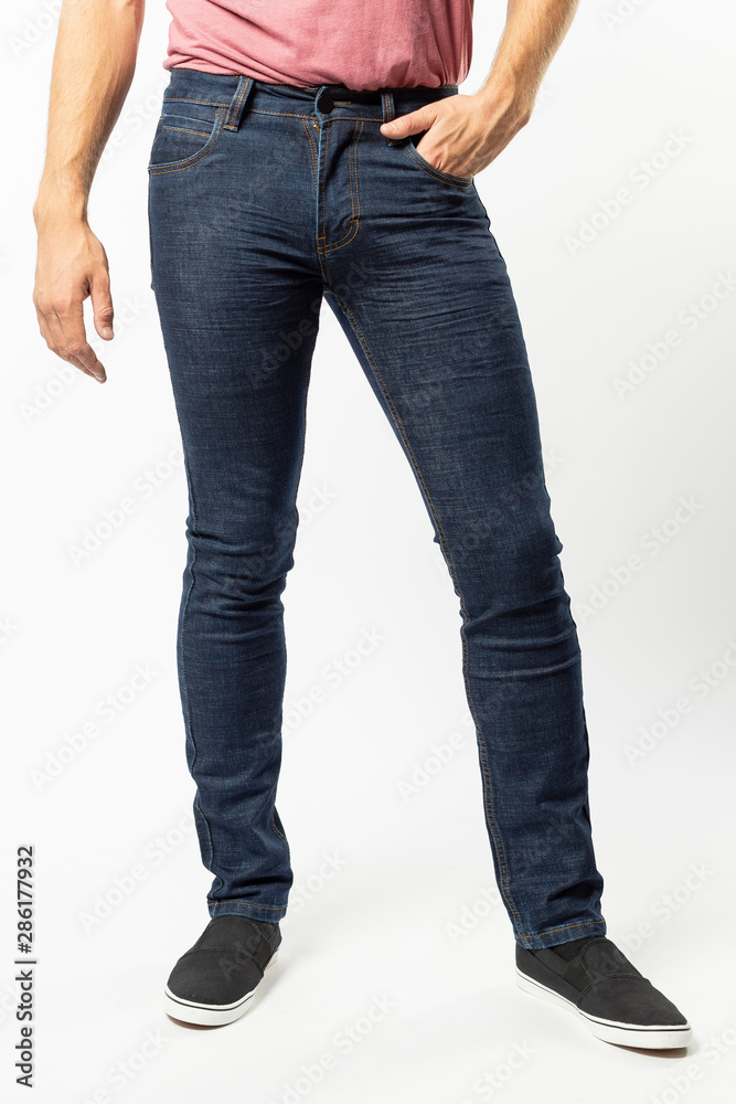 man in jeans, denim pants closeup on white background, blue jeans man in jeans, denim pants closeup on white background, blue jeans