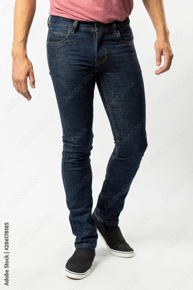 man in jeans, denim pants closeup on white background, blue jeans man in jeans, denim pants closeup on white background, blue jeans