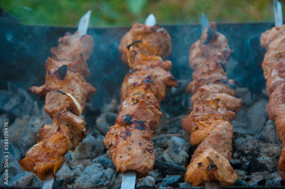 Preparation of meat slices in sauce on fire Preparation of meat slices in sauce on fire