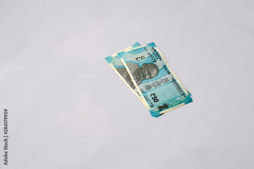 Stained & wrinkled Modern Indian Fifty Rupee Currency Notes