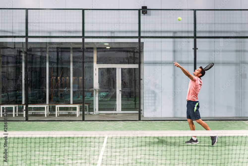 Man playing padel Man playing padel