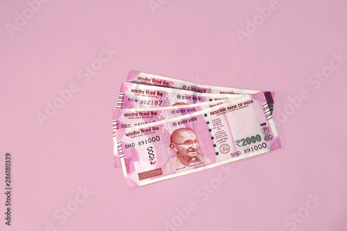 Modern Indian Two Thousand Rupees Currency Note on a minimal green background