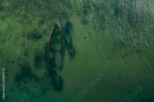 Parent and baby boat. An aerial view of the two different size shipwrecks near Paljasaare, Tallinn, Estonia photo