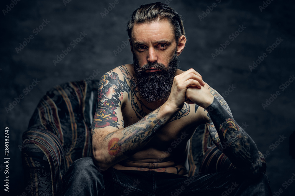 © Fxquadro - Bearded sad man is sitting in old armchair at abandoned house alone and thinking about his life. © Fxquadro - Bearded sad man is sitting in old armchair at abandoned house alone and thinking about his life.