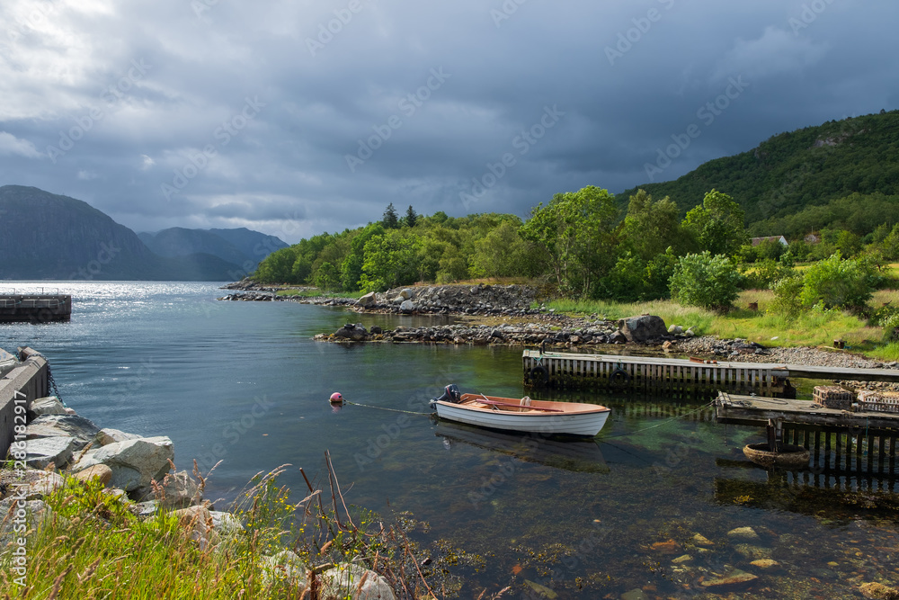 Sunny Norwegian landscape. View of the route of the Lauvvik - Oanes ferry in Norway