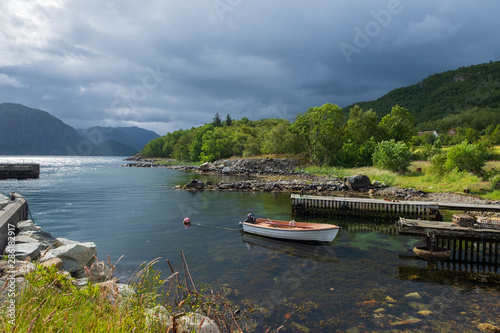 Sunny Norwegian landscape. View of the route of the Lauvvik - Oanes ferry in Norway photo