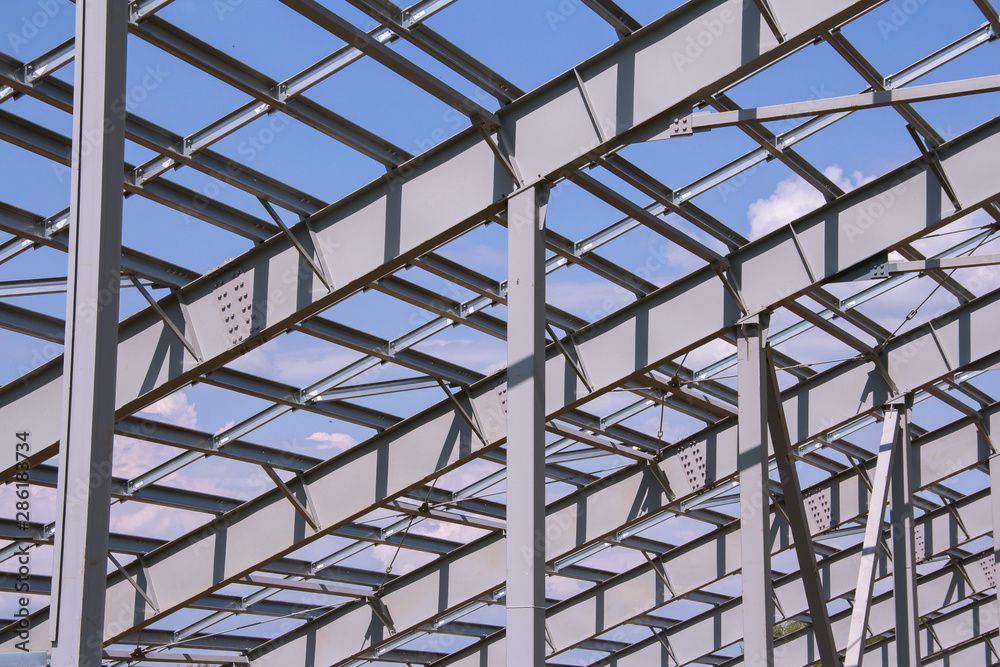 Steel structure of building construction on sky background Steel structure of building construction on sky background