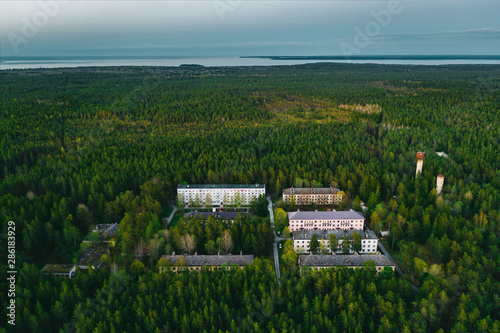 Forest town at dusk. Small remote former Soviet military town Suurpea in the middle of forest of Lahemaa national park. Estonia, Europe