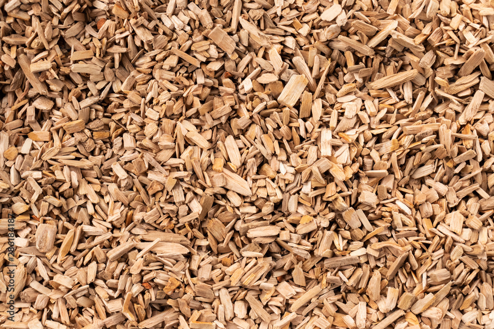 Background in the form of wood chips light brown, top view Background in the form of wood chips light brown, top view