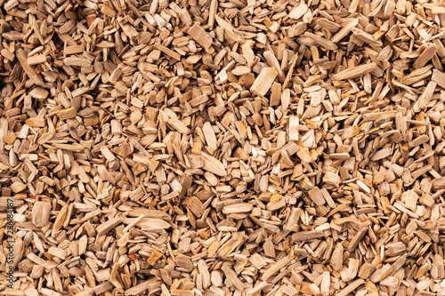 Background in the form of wood chips light brown, top view