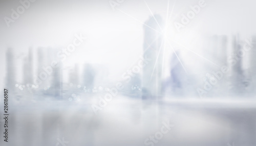 Panoramic view of the city. High skyscrapers. Blurred background. Cityscape. Vector illustration.