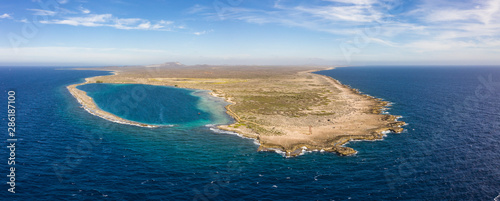 Aerial view of coast of Curaçao in the Caribbean Sea with turquoise water, cliff, beach and beautiful coral reef around Eastpoint photo