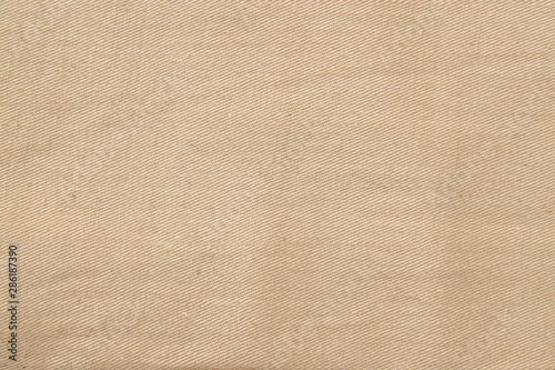 Close up brown fabric texture. Background for design and text