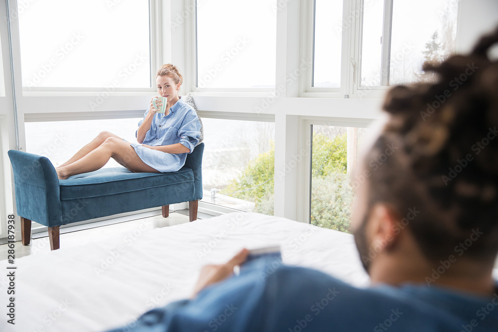 Happy couple together at home in the morning Happy couple together at home in the morning
