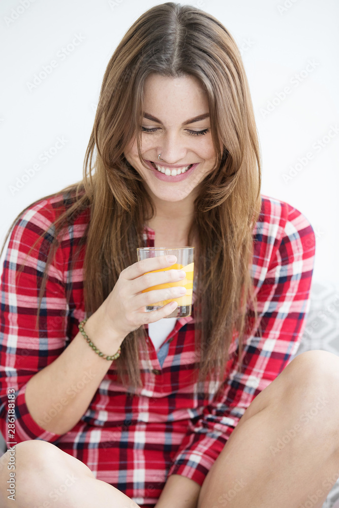 Pretty woman in early morning wearing pajamas Pretty woman in early morning wearing pajamas