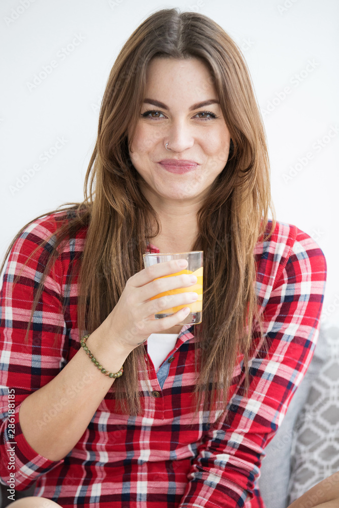 Pretty woman in early morning wearing pajamas Pretty woman in early morning wearing pajamas