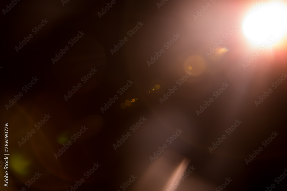 Abstract Natural Sun flare on the black background. Abstract Natural Sun flare on the black background.