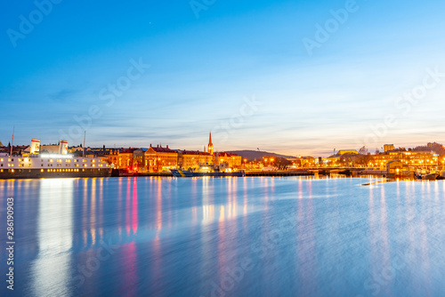 Sunset cityscape of Sundsvall and a cultural center translated as Kultural Magasinet in Sweden photo