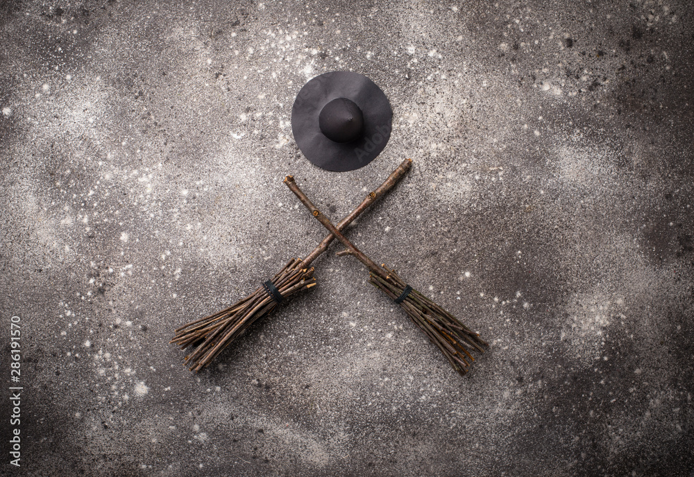 Halloween background with witches broom Stock Photo | Adobe Stock