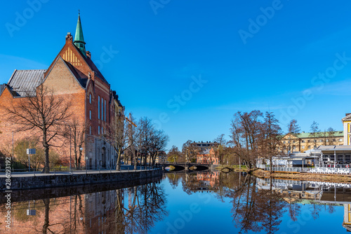 Beautiful buildings stretched alongside Svartan river in Orebro, Sweden photo