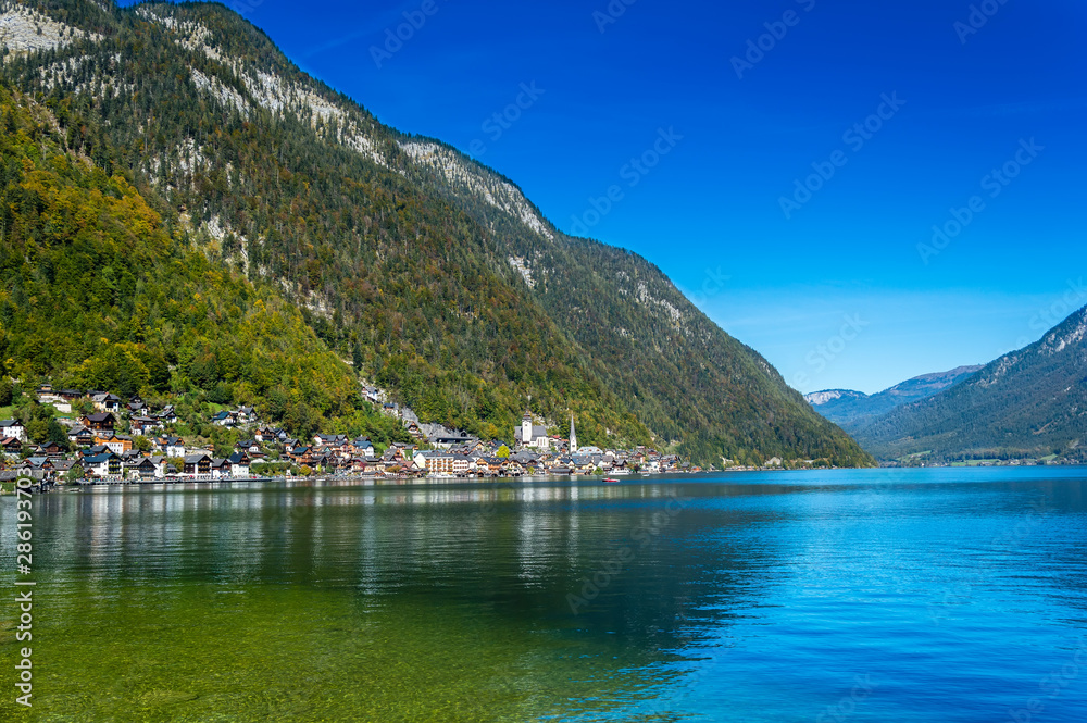 Hallstatt, Austria. Popular town on alpine lake Hallstatter See in Austrian Alps mountains in autumn
