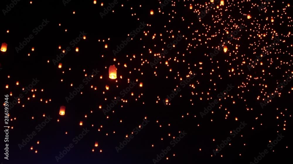 Thousands of sky lanterns are released into the night sky to wish for good luck as part of a lantern festival. Thousands of sky lanterns are released into the night sky to wish for good luck as part of a lantern festival.