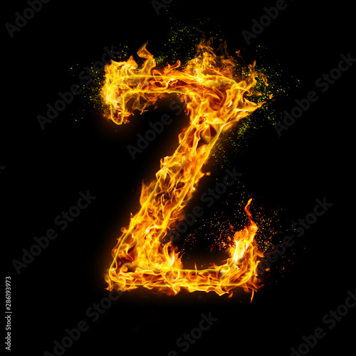 Letter Z. Fire flames on black isolated background, realistick fire effect with sparks. Part of alphabet set
