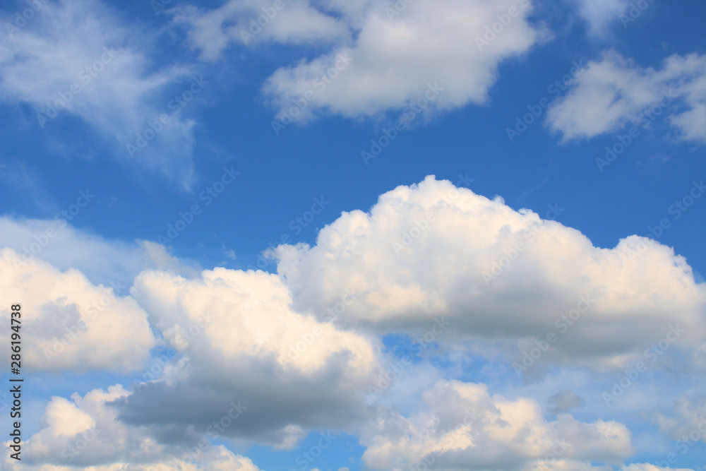 Beautiful large white cumulus clouds. Background. Landscape. Beautiful large white cumulus clouds. Background. Landscape.