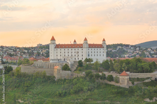 Beautiful view of the Bratislava castle on the banks of the Danube in the old town of Bratislava, Slovakia on a sunny summer day