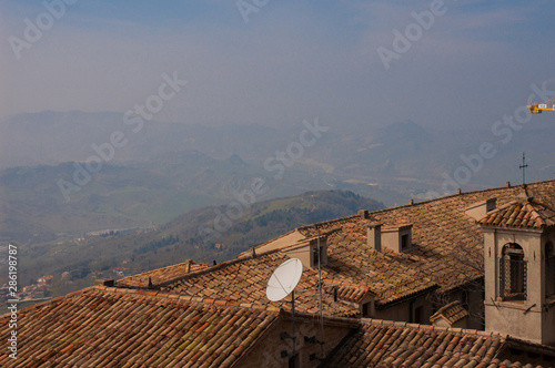 San marino misty panorama with hills and valley photo