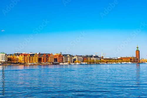 Waterfront of Stockholm with town hall at its end, Sweden photo