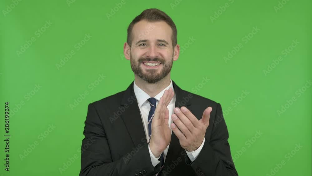 Cheerful Businessman clapping with both hands against Chroma Key Cheerful Businessman clapping with both hands against Chroma Key
