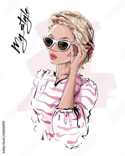 Hand drawn beautiful young woman in sunglasses. Stylish girl. Fashion woman look. Sketch. Vector illustration.