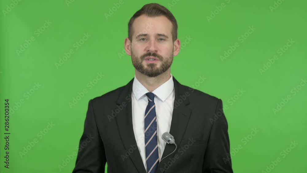 Ambitious Businessman giving Presentation against Chroma Key