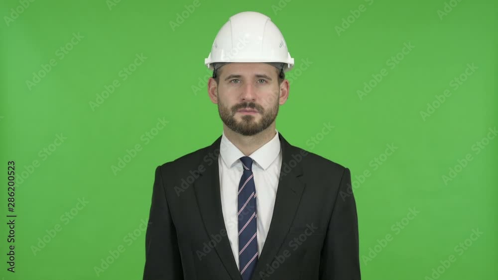 Ambitious Engineer looking in Camera against Chroma Key Ambitious Engineer looking in Camera against Chroma Key