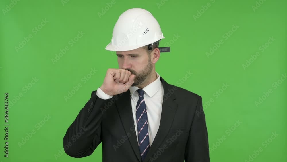 Sick Young Engineer having coughing against Chroma Key Sick Young Engineer having coughing against Chroma Key