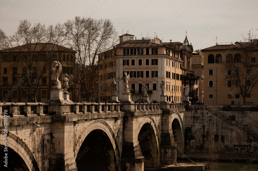 Fototapeta premium Old stone bridge in Rome