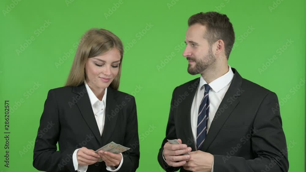 Female Professional Receiving Salary Against Chroma Key Female Professional Receiving Salary Against Chroma Key