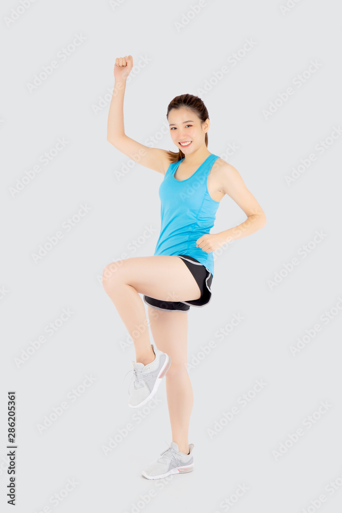 Beautiful portrait young asian woman in sport clothes cheerful with satisfied and confident isolated on white background, asia girl have shape and wellness, exercise for fit with health concept.