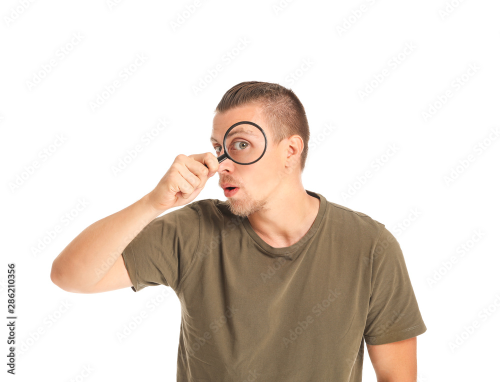Young man with magnifying glass on white background Young man with magnifying glass on white background