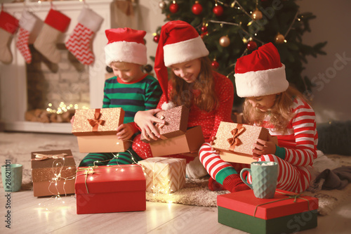 Cute little children openin...