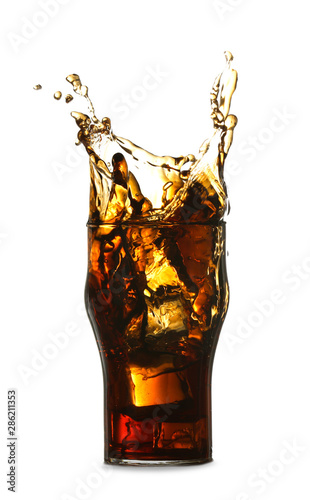 Glass of cold cola with splash on white background